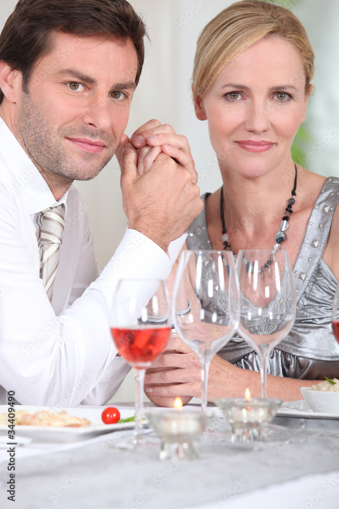 man and woman enjoying a good meal man and woman enjoying a good meal