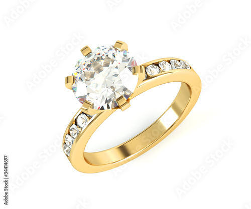 Wedding gold diamond ring isolated on white background photo