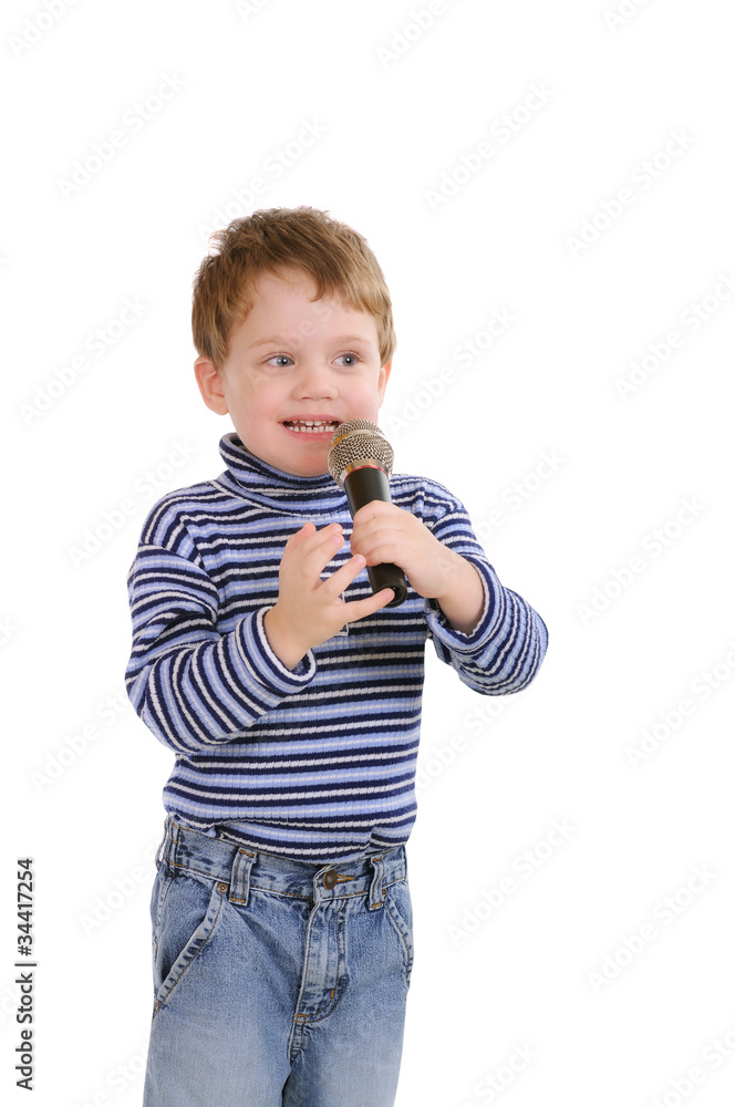 Little boy with a microphone. Isolated on white