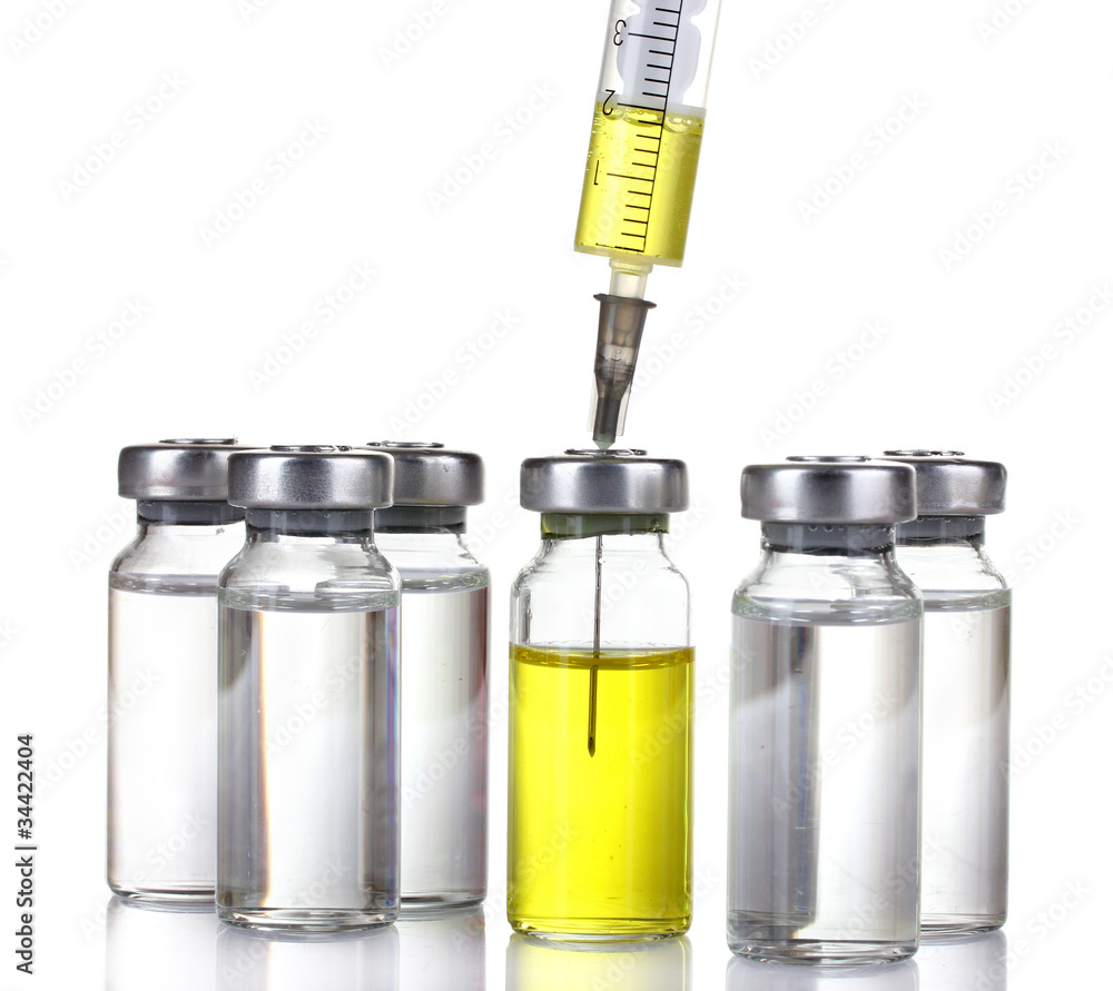medical ampoules and syringe isolated on white medical ampoules and syringe isolated on white