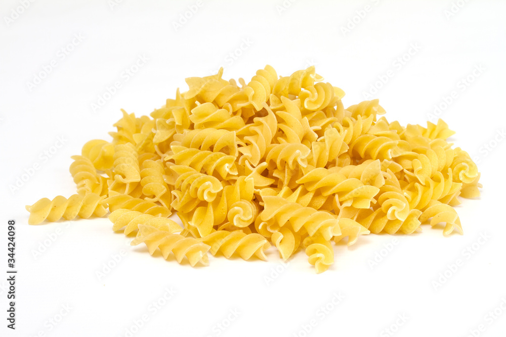 close up of a dried italian pasta on white background close up of a dried italian pasta on white background
