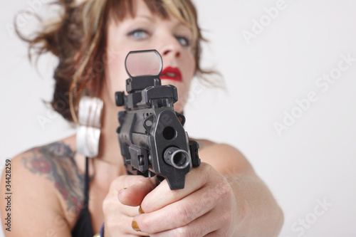 Sexy woman with an assault gun