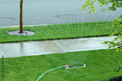 Street sprinkler in the city