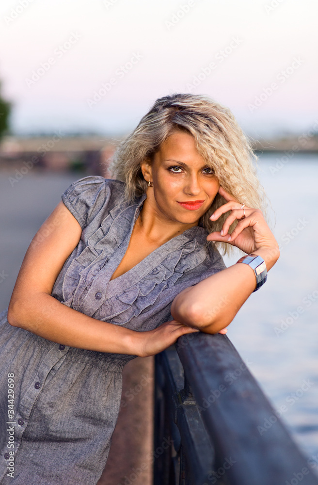 Fototapeta premium woman on a quay.