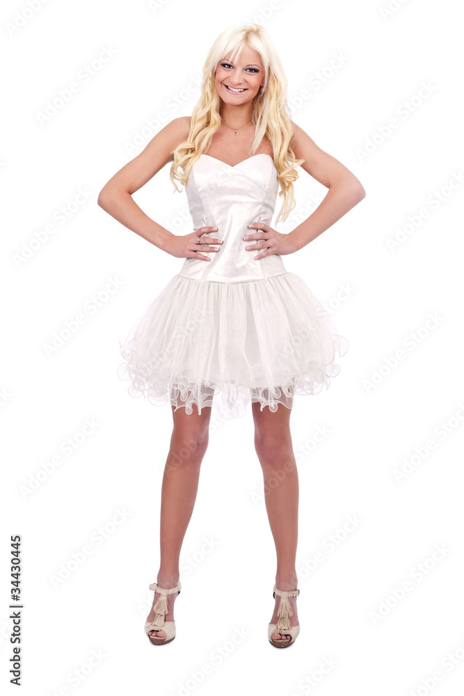 woman posing in white dress