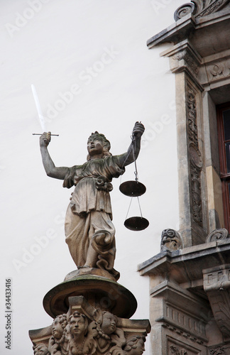 Justitia Stele historisch photo