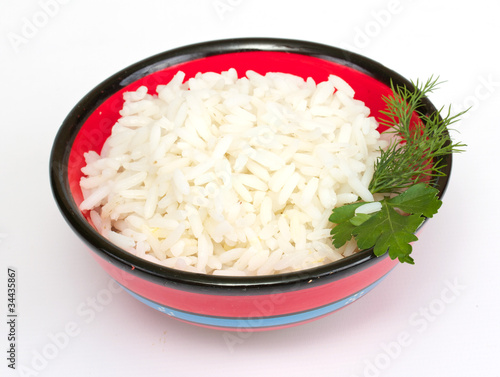 White steamed rice in red round bowl