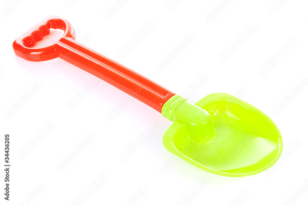 Colorful plastic shovel over white background Colorful plastic shovel over white background