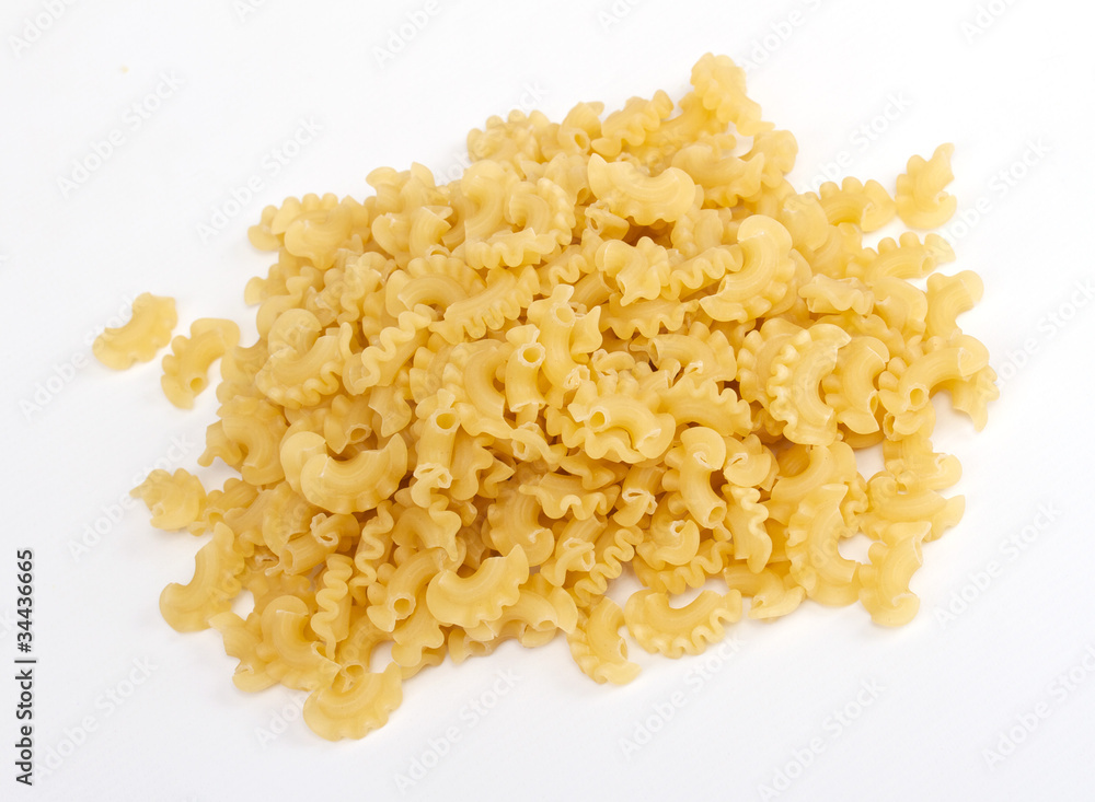 close up of a dried italian pasta on white background close up of a dried italian pasta on white background