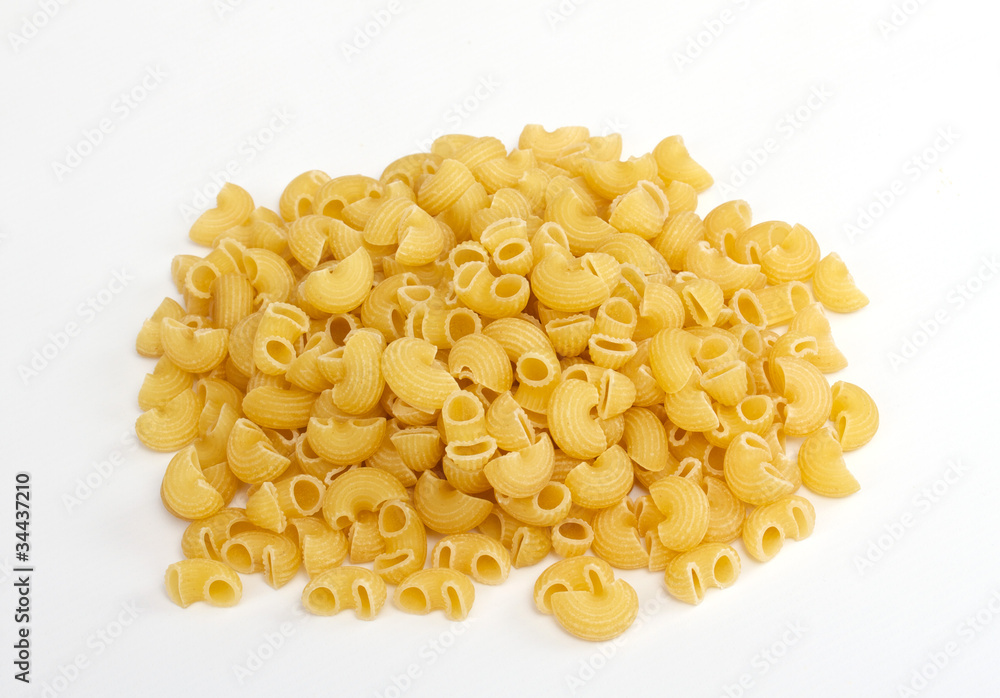 close up of a dried italian pasta on white background close up of a dried italian pasta on white background