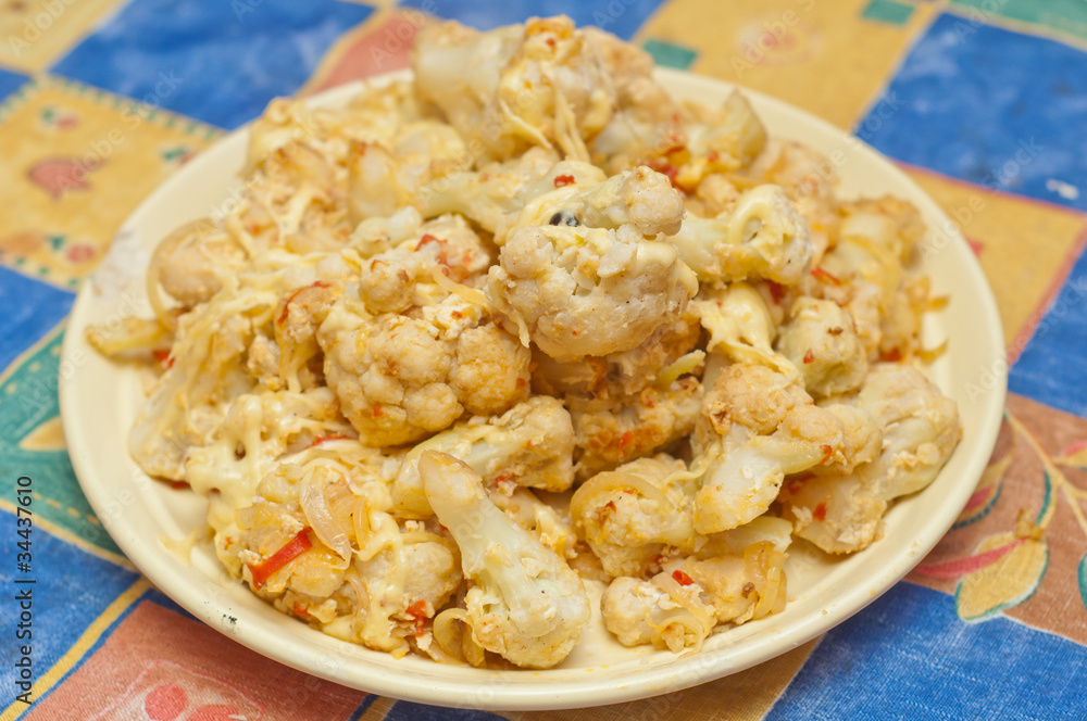 Roasted cauliflower in egg and breadcrumbs and cheese Roasted cauliflower in egg and breadcrumbs and cheese