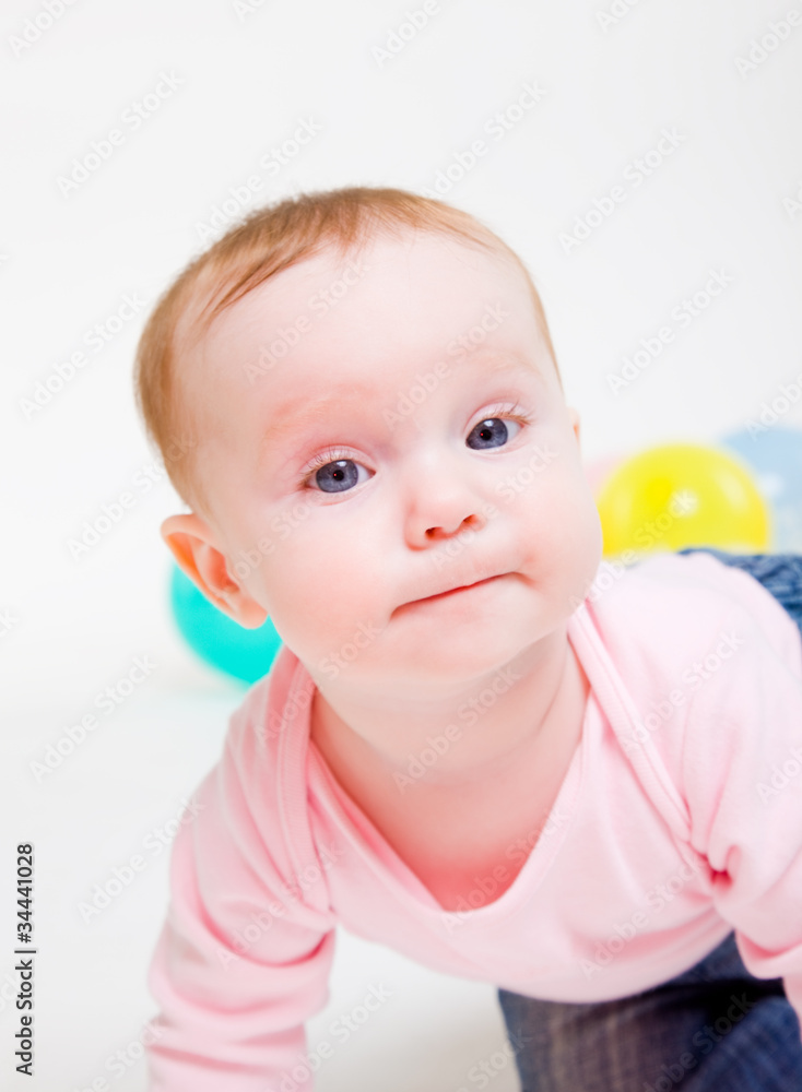 eight-monthly girl in a pink jacket eight-monthly girl in a pink jacket