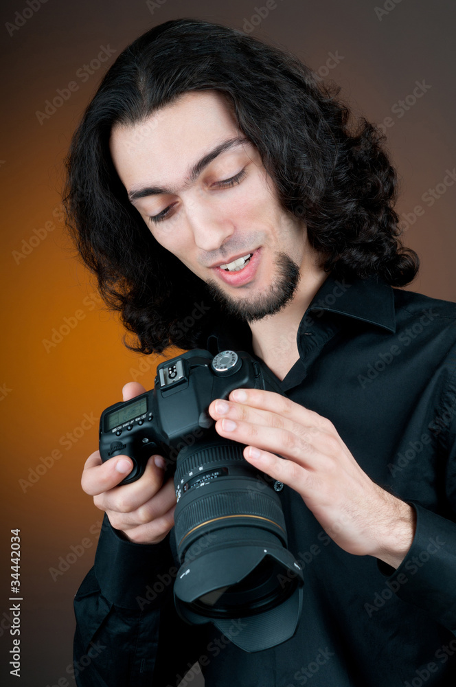 Photographer with the digital camera Photographer with the digital camera