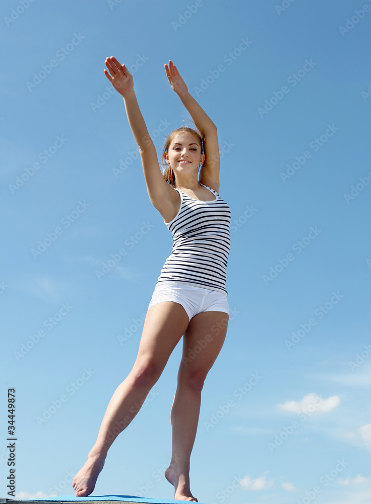 Portrait of a young woman doing exercises Portrait of a young woman doing exercises