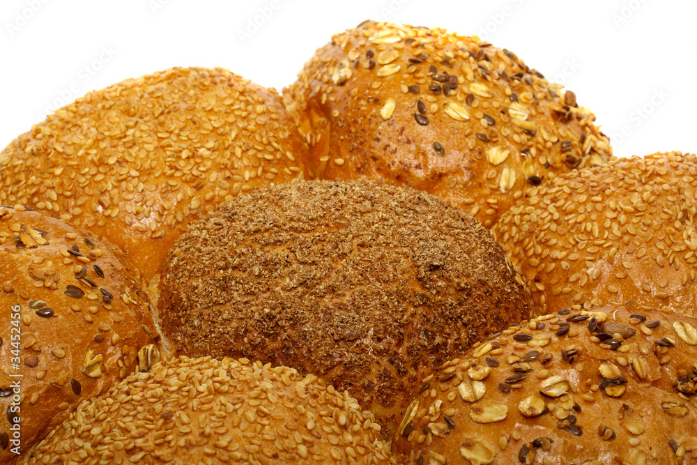 Loaf of bread and rolls isolated on white Loaf of bread and rolls isolated on white