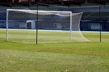 Papier peint photo Football Cage de but sur pelouse  © Jackin