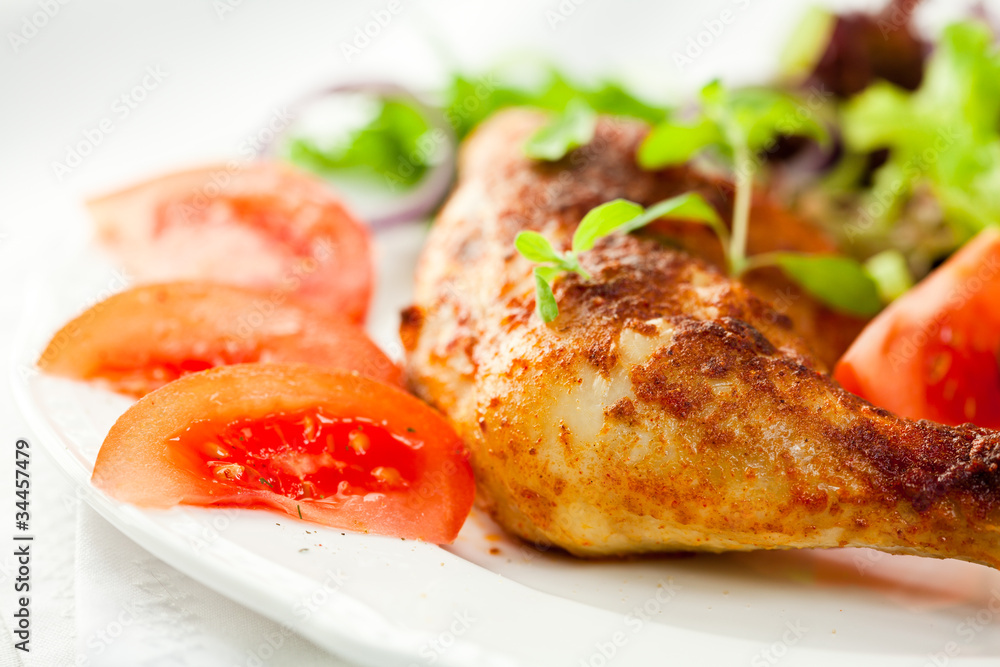 Roasted chicken leg with vegetables and thyme Roasted chicken leg with vegetables and thyme