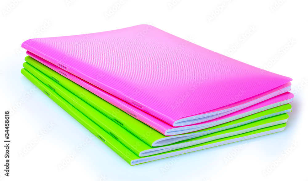 green and pink notebook isolated on white green and pink notebook isolated on white