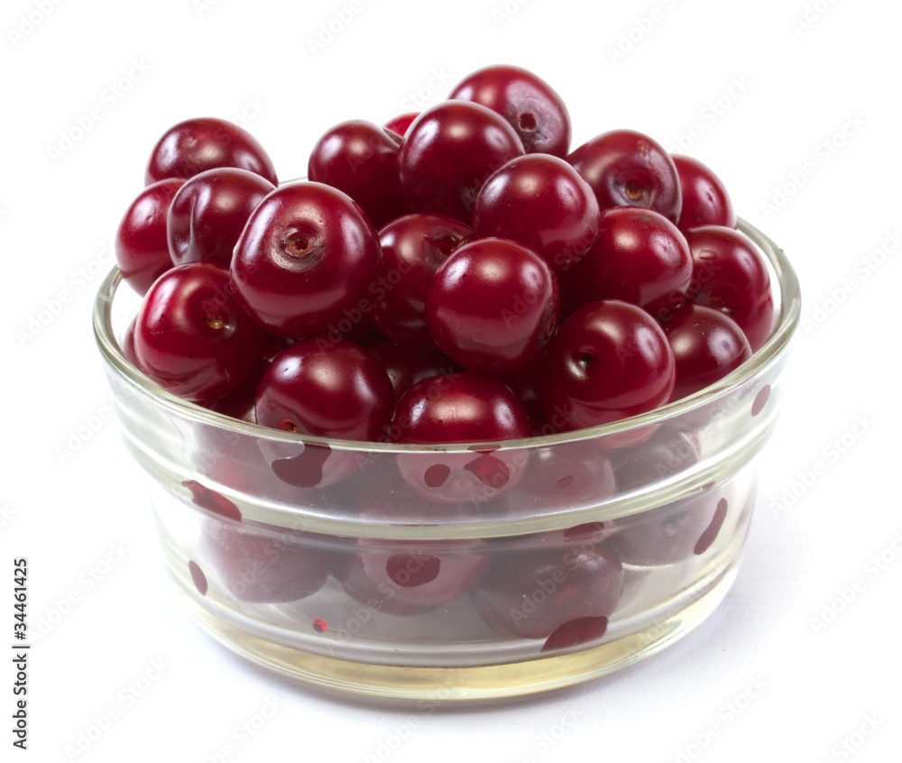 Bowl with ripe cherries. Isolated on a white background. Bowl with ripe cherries. Isolated on a white background.