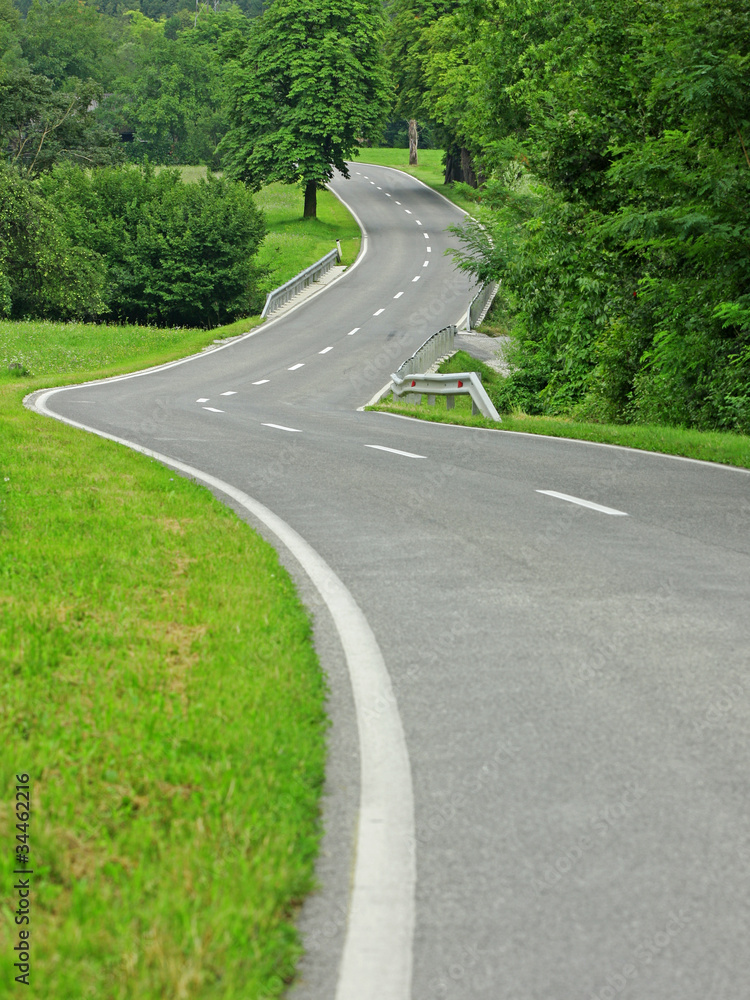 Asphalt winding curve road