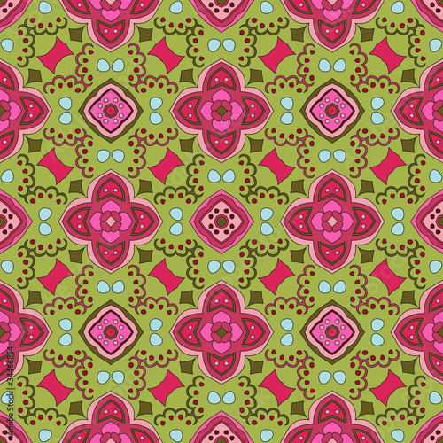 Floral pattern with dots on a green background
