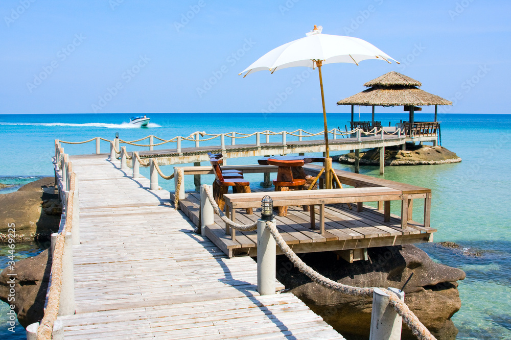 Wooden pier in tropical paradise . Thailand .