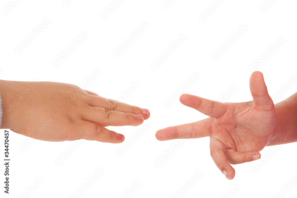 two children playing rock paper scissors