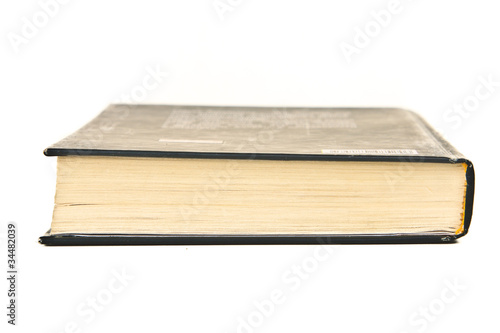 Closed book on white background