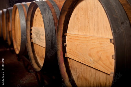 Wine barrels in an aging cellar of Ribera del Duero, Spain