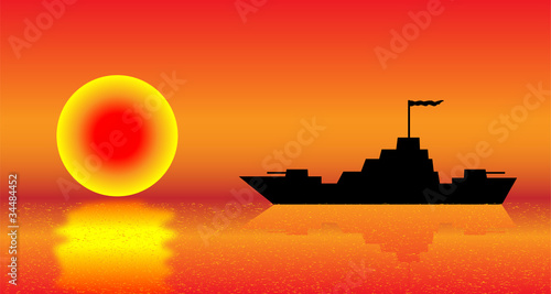 Warship at sunset
