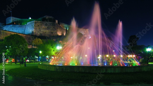 Time-lapse: fountain and New Fortress at evening, Corfu, Greece photo