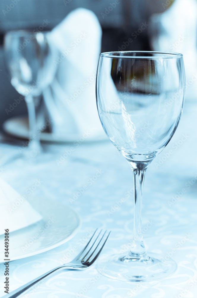 Wineglasses on the arranged table