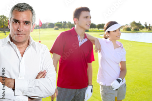 Golf senior golfer man portrait in green couse outdoor
