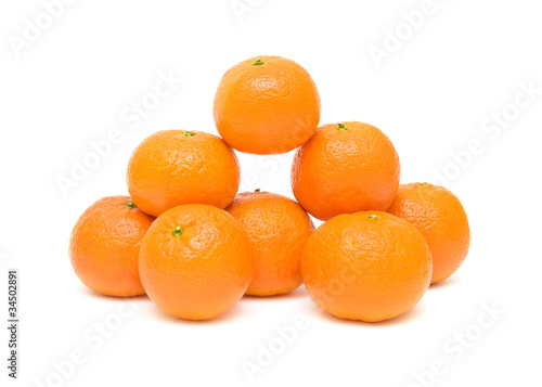 Ripe mandarins closeup, isolated on a white background