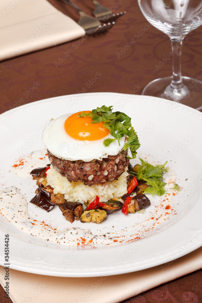 beef burger with egg and potatoes