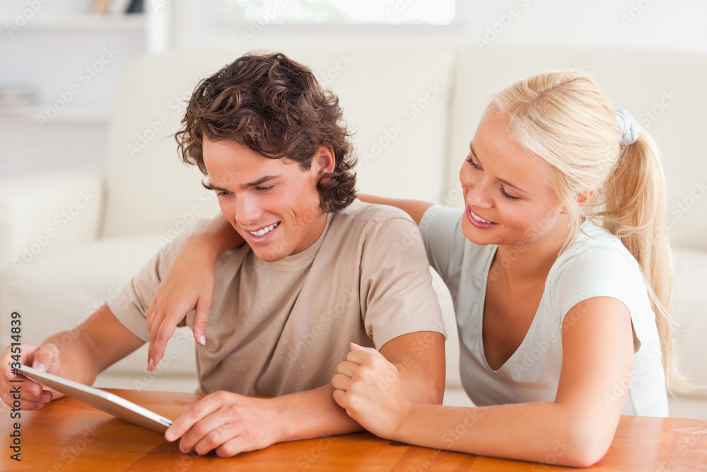 Cute couple with a tablet Cute couple with a tablet