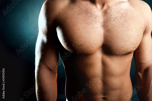 фотография Man showing his muscular body