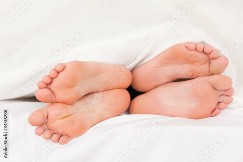 Two pair of feet