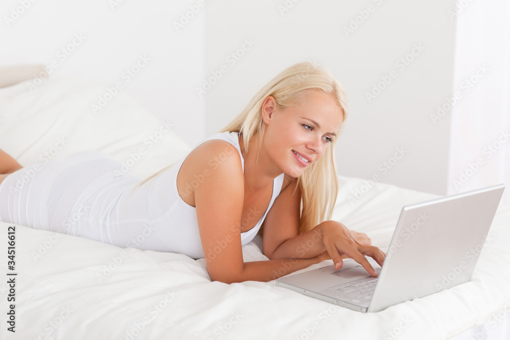 Cute woman using a laptop Cute woman using a laptop