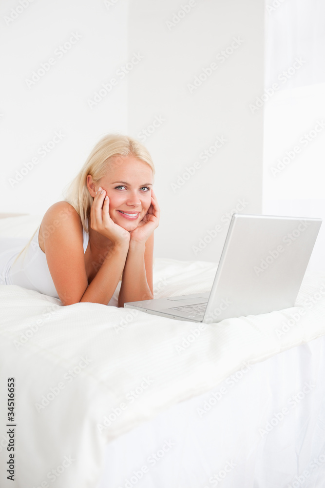 Portrait of a beautiful woman using a notebook Portrait of a beautiful woman using a notebook