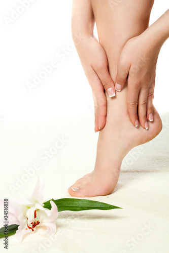 woman feet standing on towel