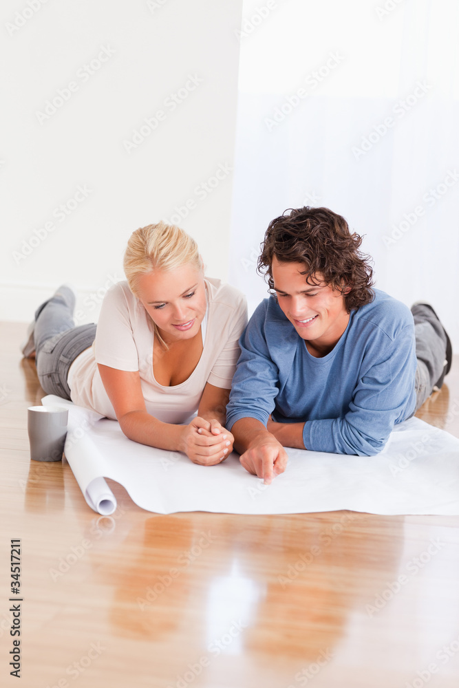 Portrait of a lovely couple organizing their new home Portrait of a lovely couple organizing their new home