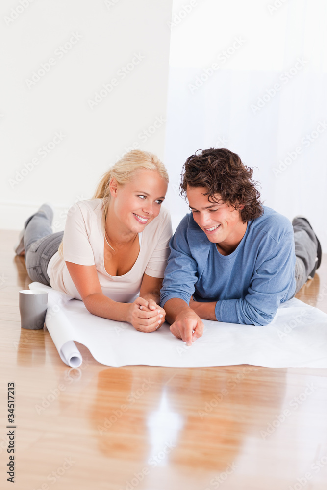 Portrait of a cute couple organizing their new home Portrait of a cute couple organizing their new home