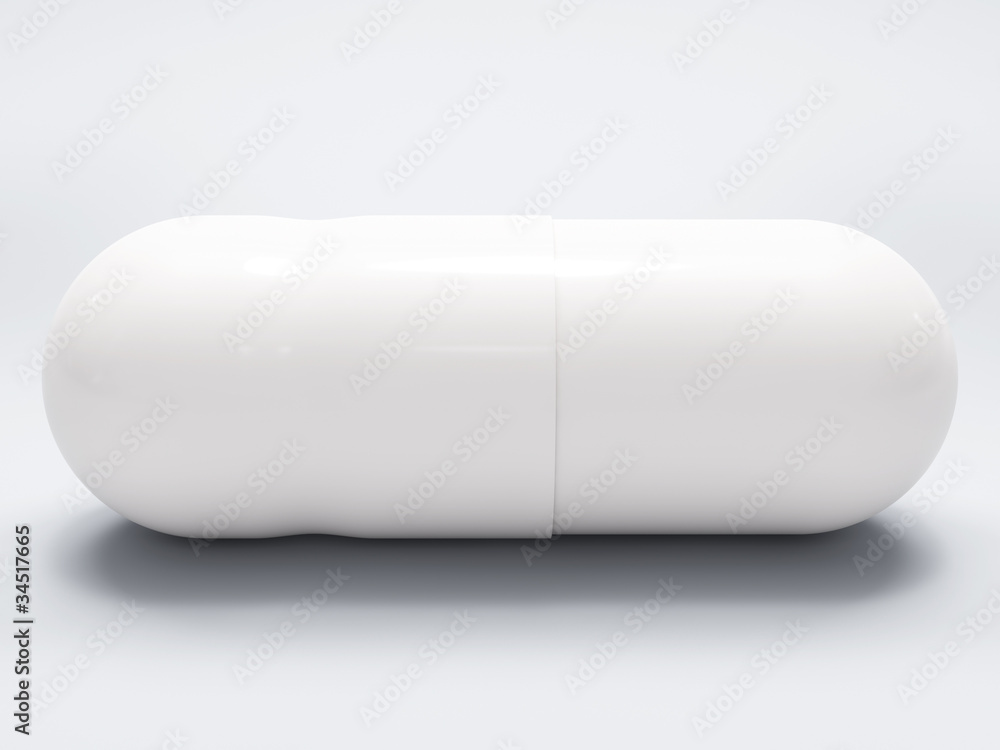 White medical pill on white background