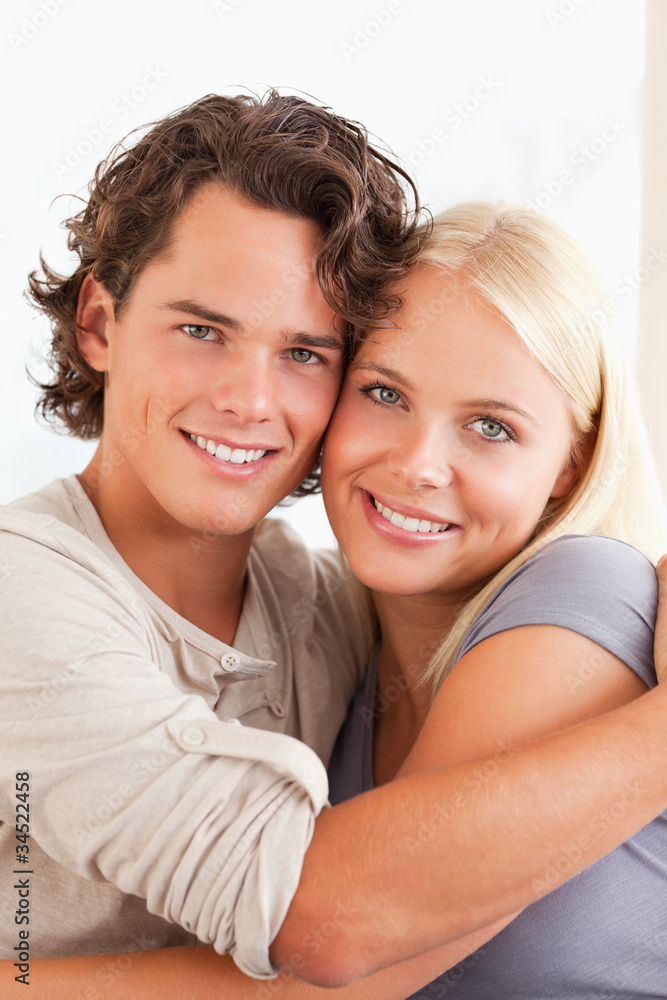 Portrait of a couple embracing each other Portrait of a couple embracing each other