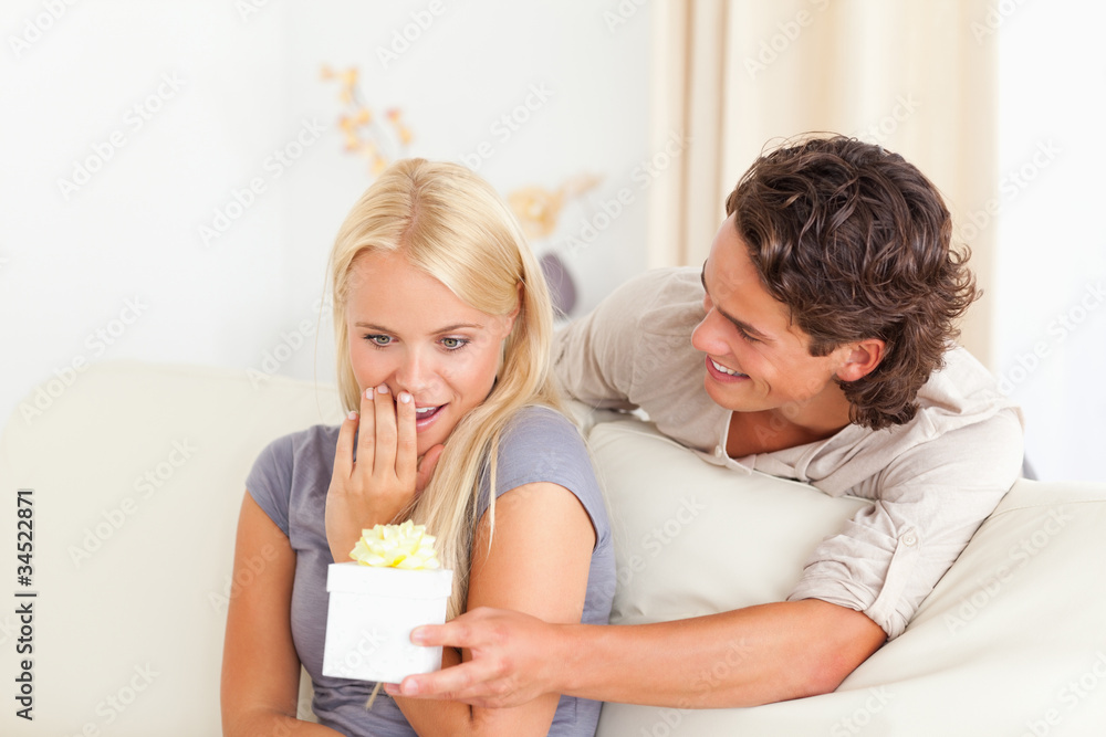 Man offering a present to his girlfriend