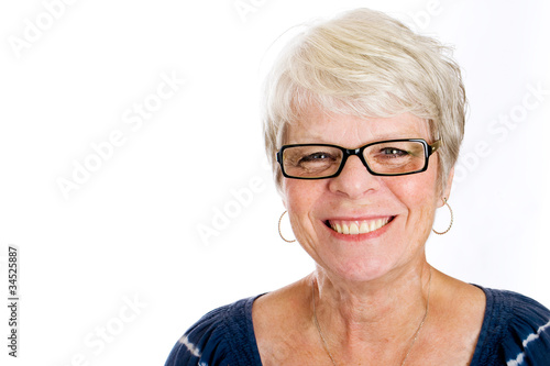 Happy, elderly woman with dark glasses