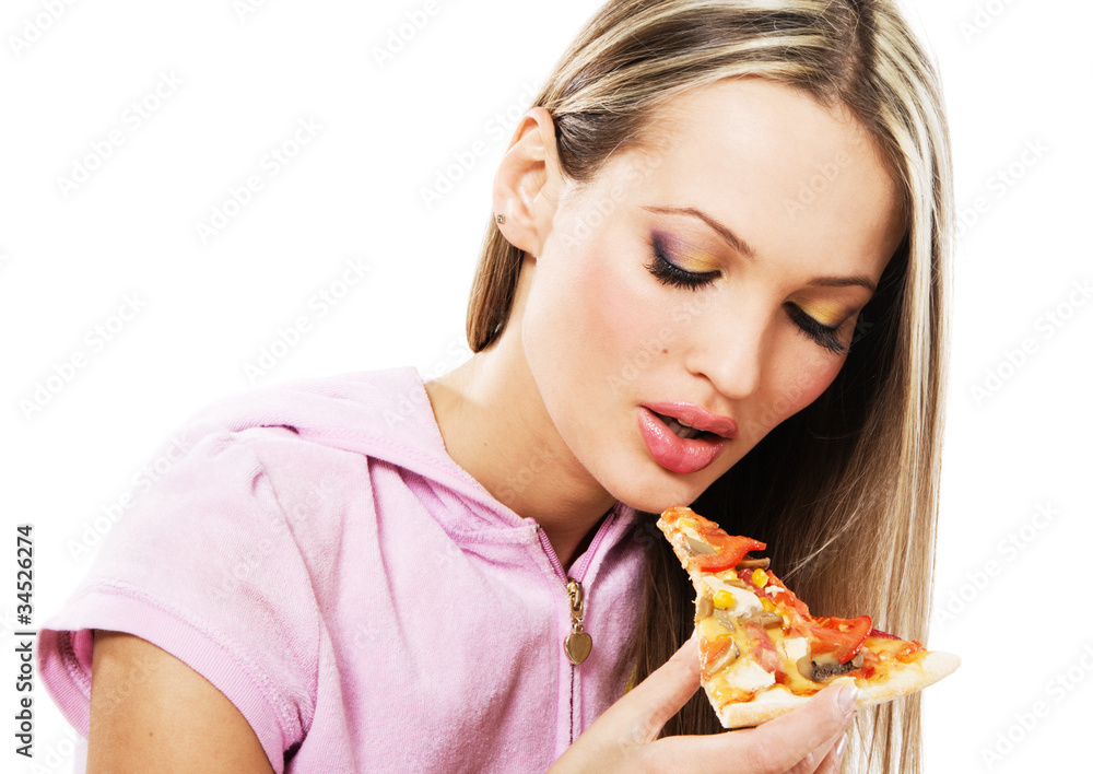 Lovely young woman eating pizza