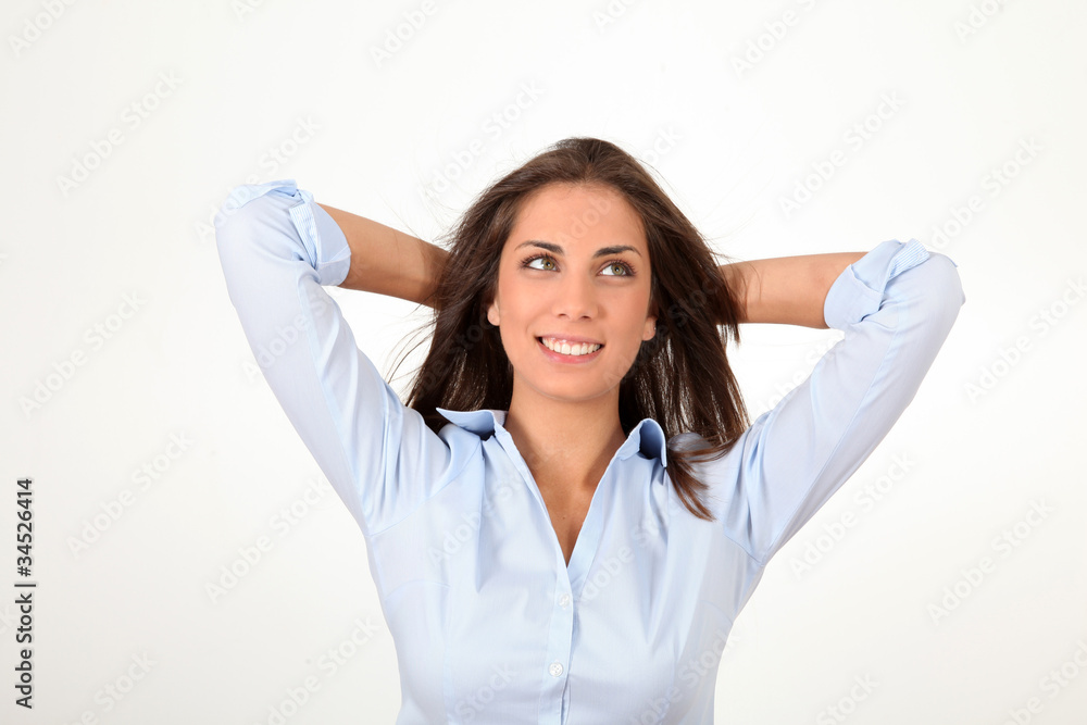 Beautiful relaxed woman with arms behing head Beautiful relaxed woman with arms behing head