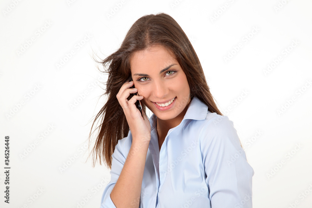 Portrait of beautiful young woman talking on mobilephone Portrait of beautiful young woman talking on mobilephone